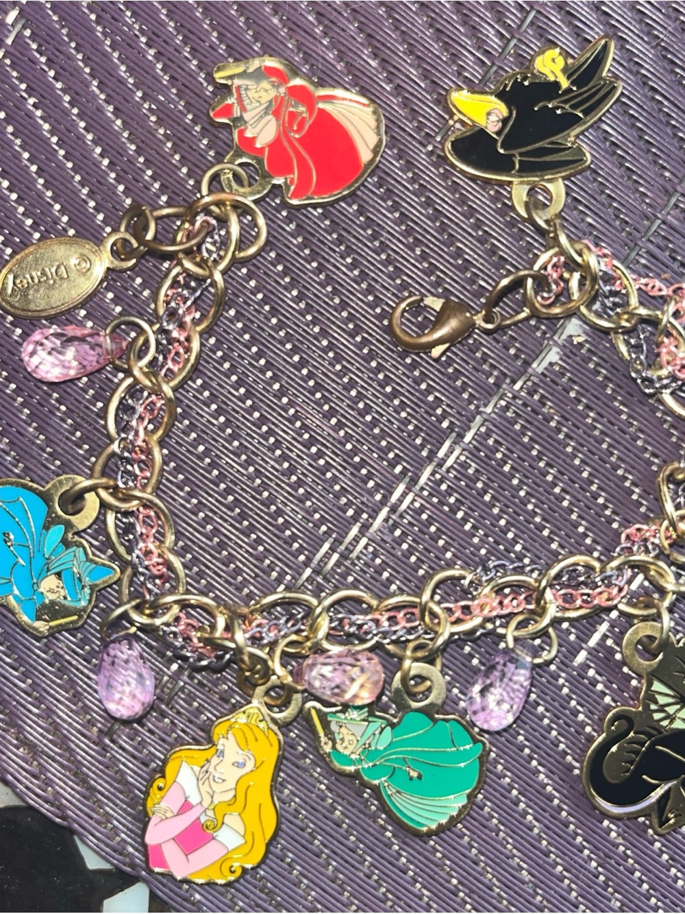 Disney Gold-Tone Charm Bracelet with Pink, Teal, Black and Yellow Accents